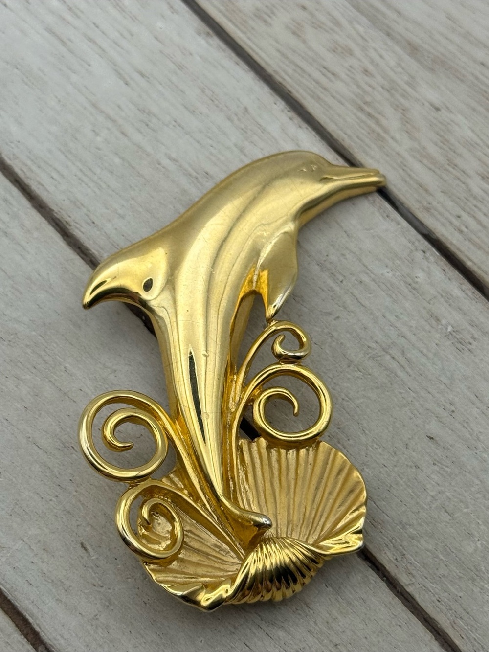 J.J Gold tone Dolphin Shell Brooch Pin
